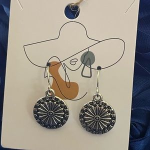 Silver tone medallion earrings